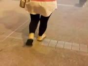 Asian woman walking alone