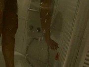 SPYCAM milf shaving legs and armpits in the shower