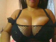 Playing with her big ass tits