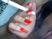 indonesian babe giving bj while smoking