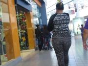 Latina thick booty jiggles and shakes thru mall in spandex