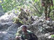 Army boys scout for hard meat outdoors