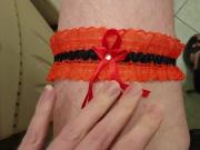 Red garter and black high heel sandals cum