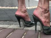 veiny feet in high heel mules