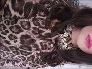 crossdresser in wife's leopard print dress