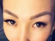 horny asian kazakh chick sucking banana