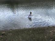 wetting gown in lake , wetting