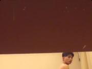 Tall and slender boy is served by woman