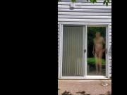 Naked at back door