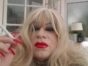 Natassjja smoking transvestite long red nails