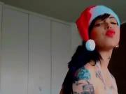 sexy brazil tattooed girl striptease in christmas outfit