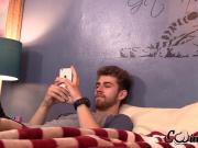 Gay jock Andrew plays on phone in solo masturbation session
