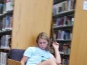 Teen in flip flops at the library