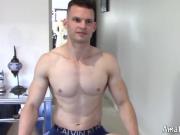 Athletic jocks tease their big cocks while moaning from joy