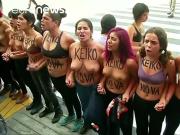 Topless protesters clash with police in Peru