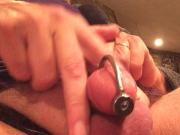 Sounding with chastity cage and masturbating