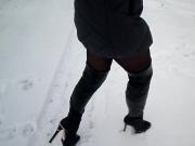 Walk on the snow in high heels in nylon pantyhose