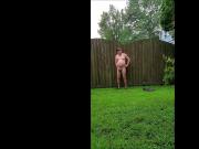 Strip and pee in backyard