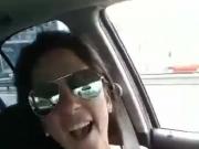 Sexy MILF singing topless in his car