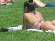 Asian sunbathing in thong