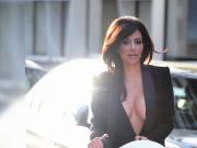 Kim K braless cleavage