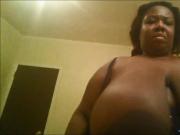 Black BBW plays with her huge tits