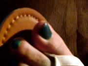 Wife in sandals shoeplay