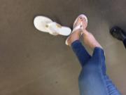 Candid and cute teen feet while out shopping