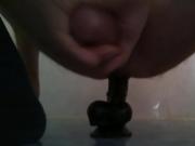 Masturbating with a toy in my ass.