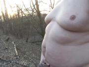 Chubby masturbates in the woods