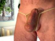 Enjoying the stretchy, sparkly fishnet g-string