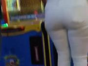 Candid latina with a big ass in tight white jeans.