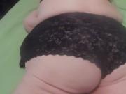 black panties laying down