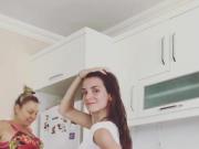 Non nude pretty girl dances in her kitchen