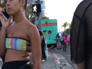Sexy rave girl standing in the street