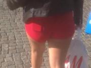 Teen in red shorts with very nice butt