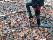 Red catsuit, thigh high boots and deep mud!!!