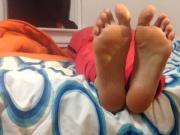 Laying down white feet