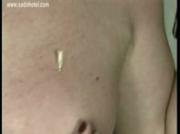 Milf slave gets needles on her tits pulled