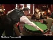 Bound slaves cleaning poker table in the upper floor