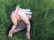 breasty teen dildoing cunt in the grass