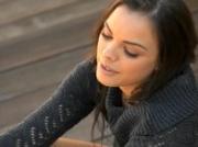 woman rubbing the clit behind the house