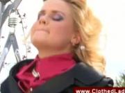 Two clothed ladies fucked in a swing