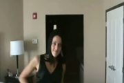 Sexy brunette stripping and teasing