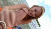 Strawberry blond chick giving bj in the nude beach