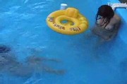 Cute lesbians in a pool