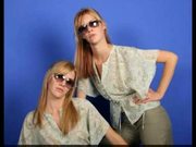 Identical lesbian twins posing together and showing all...