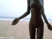Skinny ebony village girl dancing naked in the rain with her perfect slim body