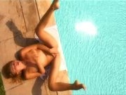 Sexy girl masturbates by the pool