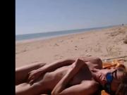 Nina 27 fingering on a public beach